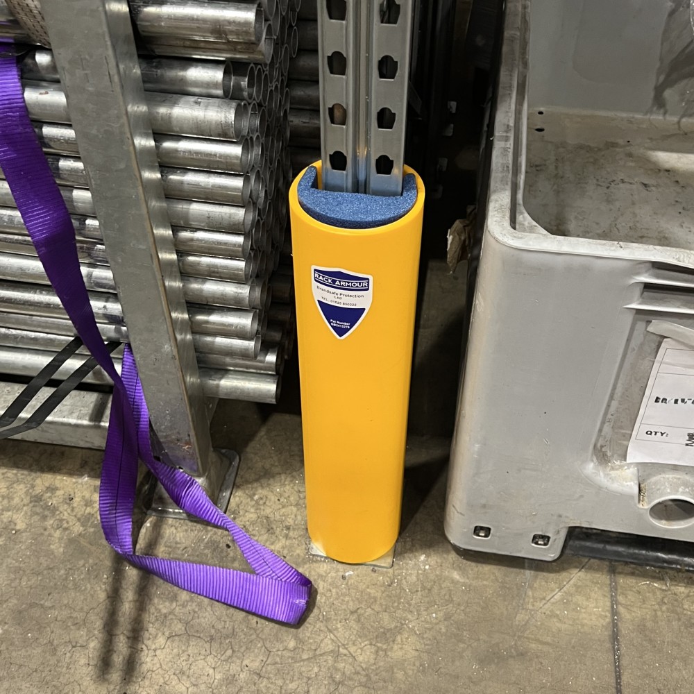 Close-up of a Rack Armour protector installed on a pallet racking upright, designed to prevent impact damage and enhance warehouse safety.