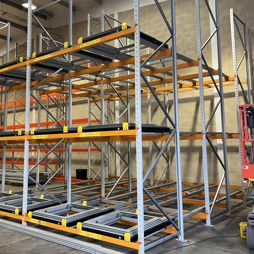 Close-up view of the completed push-back racking installation, showcasing half the bays and full height for efficient warehouse storage.